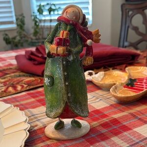 Charming Holiday Figurine with Green Coat and Red Scarf